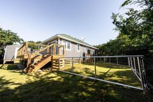 Watermens Hideout - Waterfront 2-Bed, 1-Bath Cottage with HOT TUB & Private Dog Run!