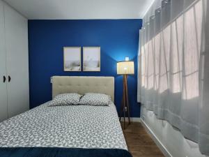 Charmoso apartamento perto da praia em Jardim Camburi