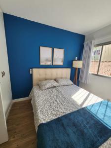 Charmoso apartamento perto da praia em Jardim Camburi