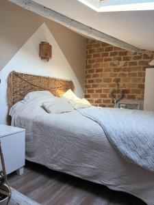 Duplex climatisé avec parking et borne électrique