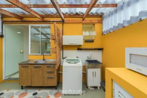 Sobrado com 2 suítes em Perequê BFJ0506