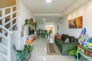 Sobrado com 2 suítes em Perequê BFJ0506