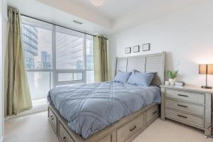 Modern 2BR City View Retreat with Balcony & Workspace