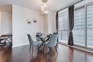 Modern 2BR City View Retreat with Balcony & Workspace