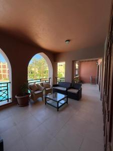 Lovely first floor tow bed rooms overviewing circular pool for families only in Talabay Aqaba