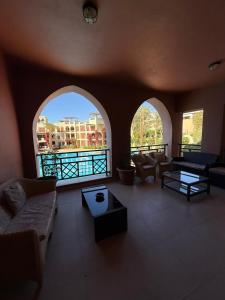 Lovely first floor tow bed rooms overviewing circular pool for families only in Talabay Aqaba