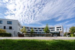 Godewindpark Deluxe-Apartment 1-10 mit Gartenblick