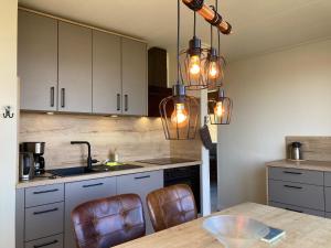 6pers. Lauwersmeer Lakefront. Nirvana house with sauna, pellet stove