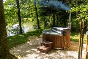 Chalet et étang, exclusivement privée