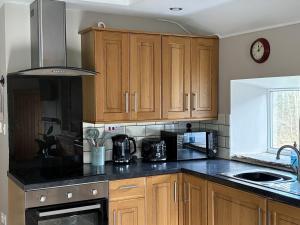 Mill House Cottage, on a Fishing Park near Brampton with hot tub