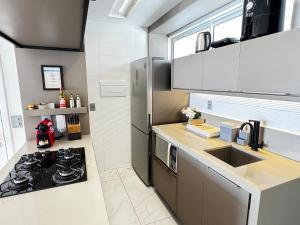 Branco Haus seu espaço Pé na areia Caribessa