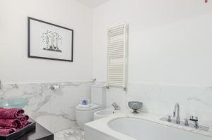 Isola Green Oasis - Loft with Garden & Free private Garage