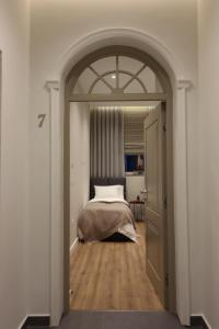 Rroji Urban Heritage - Boutique Rooms & Serviced Apartments in City Center