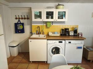 appartement en rez de jardin et terrasse dans villa
