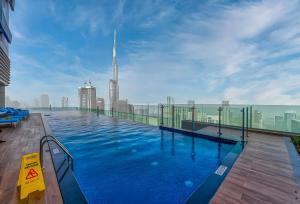High-Floor 2BR with Skyline, Sea & Burj Khalifa View