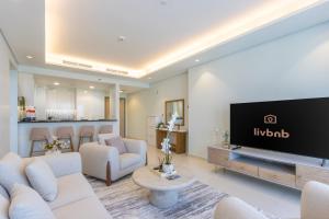 High-Floor 2BR with Skyline, Sea & Burj Khalifa View