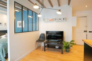 Grand studio loft bien equipe a Paris 15 - 2P