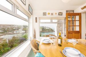 Longships looks across the cove of Portmellon
