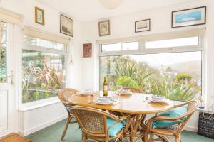 Longships looks across the cove of Portmellon