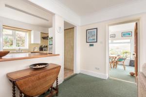 Longships looks across the cove of Portmellon