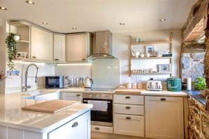 Emelle Kingsand near the waters edge