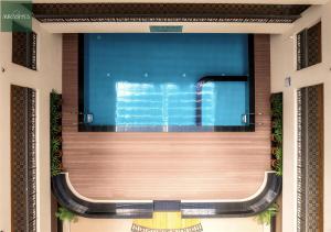 Candolim 2BHK Luxury Duplex Apartment with Pool & Balcony - 5 Minutes to Beach