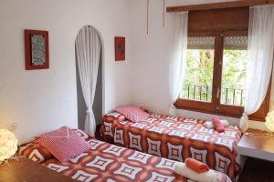 Casa rural amb cova - Cal Gravat