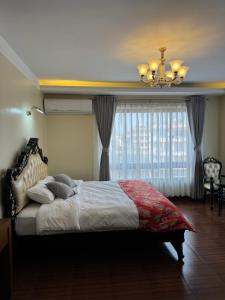 Tashi Tagay Hotel & Apartment