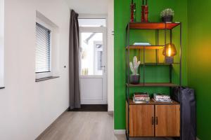 Welcome in - Beneden appartement direct aan het Sneekermeer met tuin