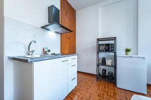 Open the Window and Feel the Historic Porto