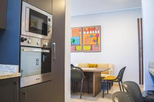 Chic Palm Hills Retreat-1BR The Village New Cairo