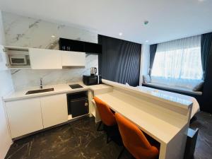 Walk to Nai Harn Beach Pools Gym Resort Facilities