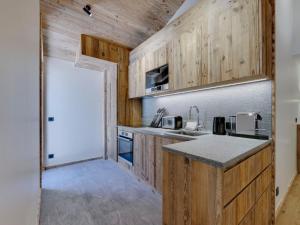 Appartement duplex à Val dIsère, sauna, cheminée, 4 chambres en suite, parking, pour 8 personnes - FR-1-567-123