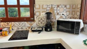 Vila do Sussurro - Casinha Céu