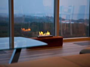 Apartment Wohnung mit Panoramaverglasung und Meerblick by Interhome