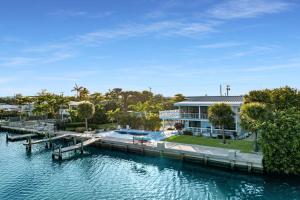 Sitting at the Dock on the Bay plus Waterfront Pool Home