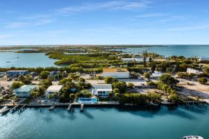 Sitting at the Dock on the Bay plus Waterfront Pool Home