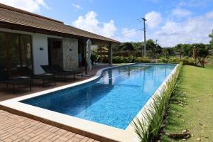 Village com varanda gourmet próximo a Praia da Espera