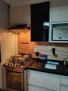 Apartamento ao lado do aeroporto e HU