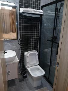 classy executive two bedroom apartment with swimming pool, fully equipped gym ample parking space children playing ground and amazing scenic views