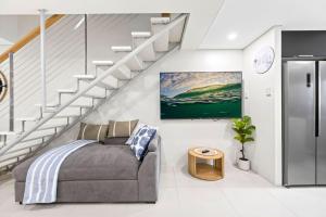 The Wharfside Oasis by the Waves