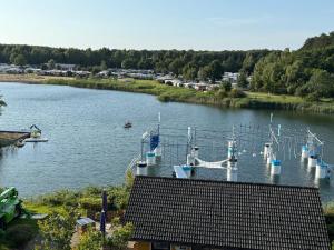 Mobilheim Wattwurm mit Veranda am Kransburger See 555