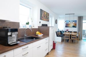 Am Kutterhafen 25 - STINDTS DEICHHUES