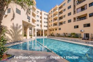 The Signature Patio Duplex