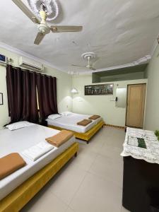 Green Wave - Your Budget Stay