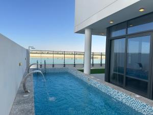 Beachfront Villa with Heated Private Pool & Jacuzzi