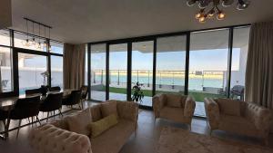 Beachfront Villa with Heated Private Pool & Jacuzzi