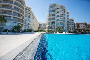 Elegant Apartments with Private Beach Access at Scandic Resort