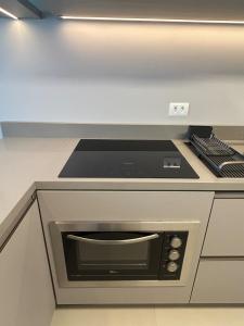 Apartamento 2 Quartos para até 7 Pessoas com Garagem no Portão