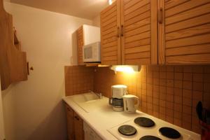 Résidence Trois Vallees - VAL THORENS SPACIEUX 2 PIECES CABINE POUR 4 PERSONNES PROCHE DE TOUT MAE-7627